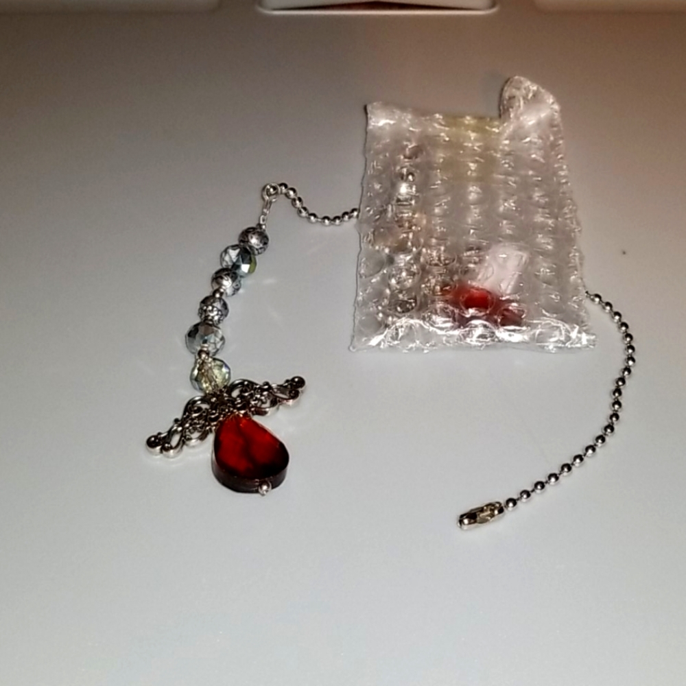 VINTAGE ANGEL FAN PULLS...AMBER